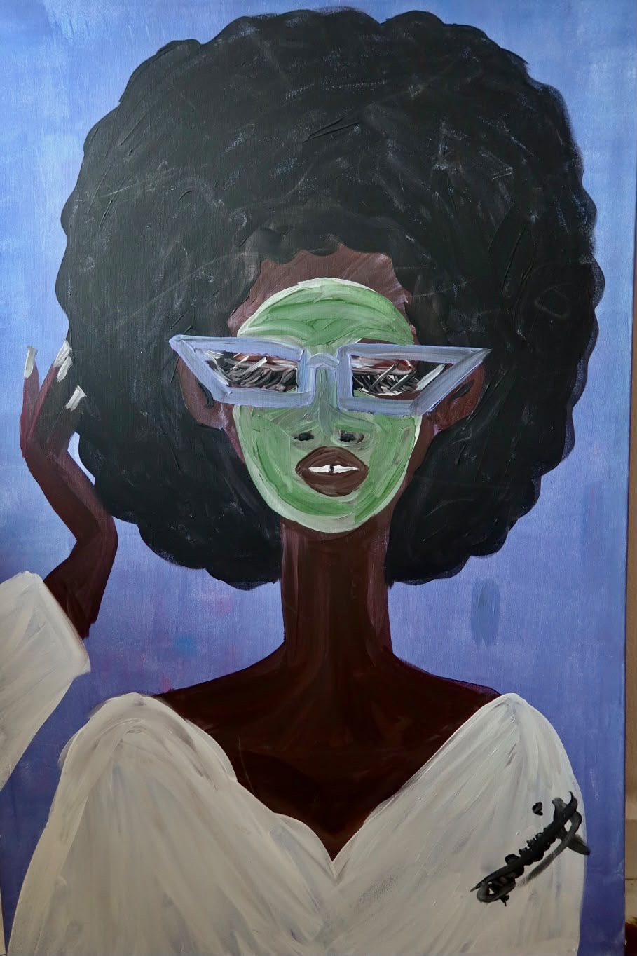 Afro & Glasses artwork printed on a white T-shirt